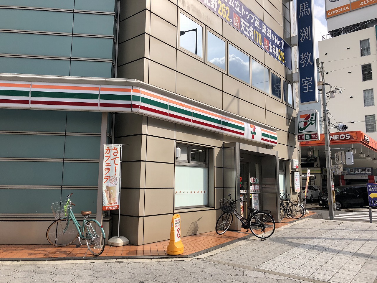 ファヴール南堀江 コンビ二：セブンイレブン 大阪西大橋駅前店　558m